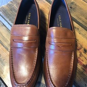 Never worn/new Cole Haan Grand Os slip ons.